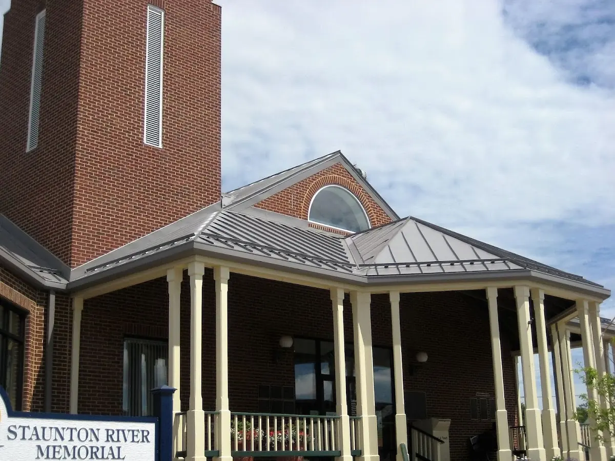 Skilled roofing craftsmen working on a residential roof in Eglin Village